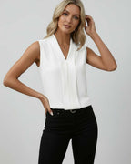 Monaco Top – Elegant sleeveless V-neck white top by Lauven, perfect for modern sophistication and versatile styling.