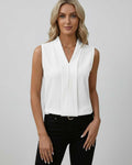 Monaco Top by Lauven, elegant sleeveless V-neck white top, perfect for modern sophistication and versatile styling.
