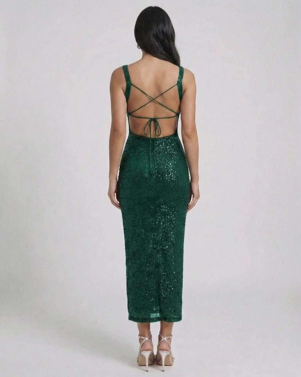 Lauven Nara Midi Dress back view featuring emerald green sequined design and crisscross straps.