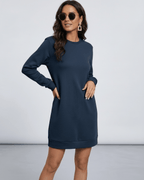 Model wearing the Lauven Nero Mini Dress in deep navy, showcasing its casual O neck and long sleeves.