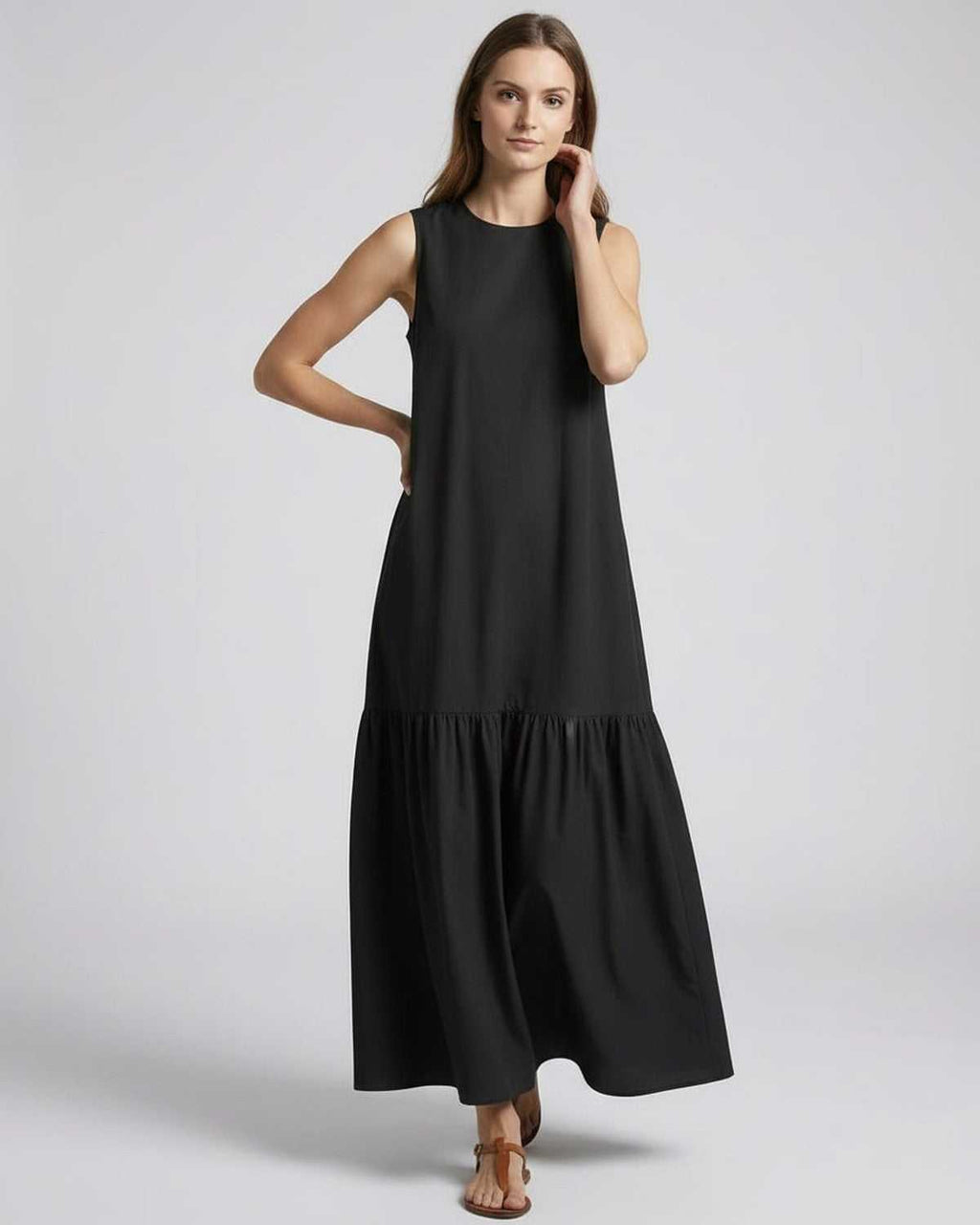 Nocta Midi Dress by Lauven, black sleeveless design, relaxed silhouette, ideal for casual summer elegance.