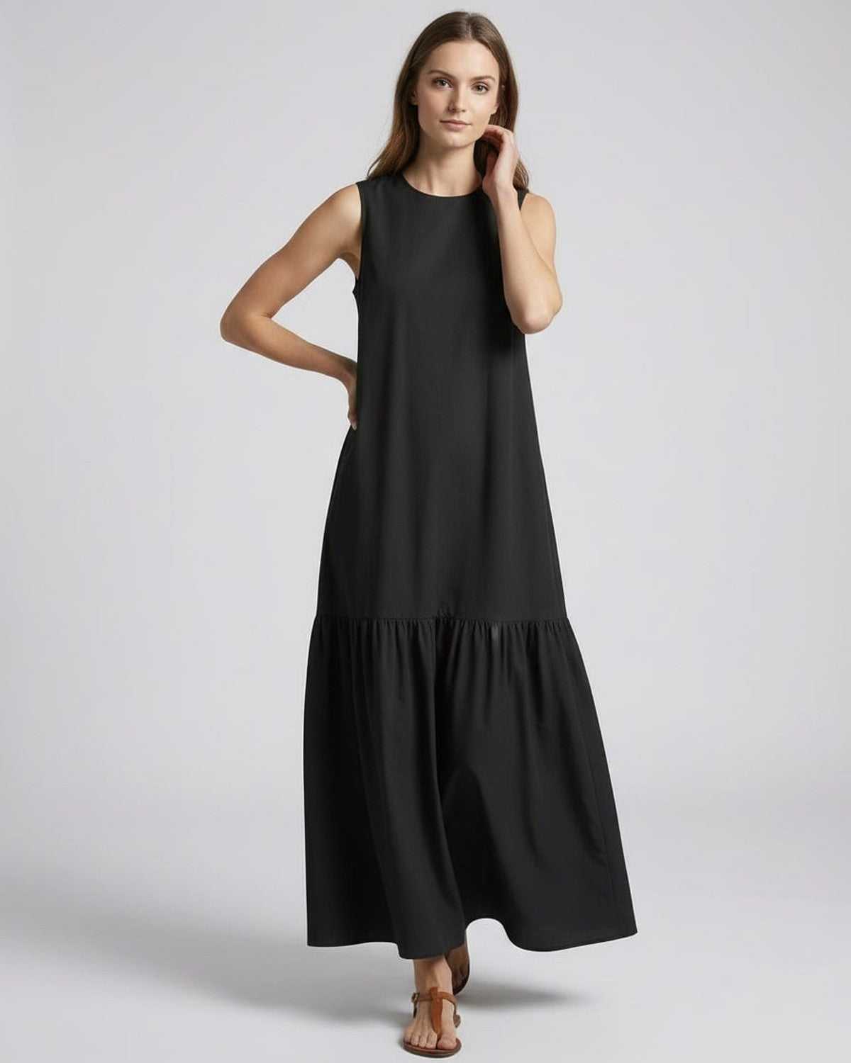 Nocta Midi Dress by Lauven, black sleeveless design, relaxed silhouette, ideal for casual summer elegance.