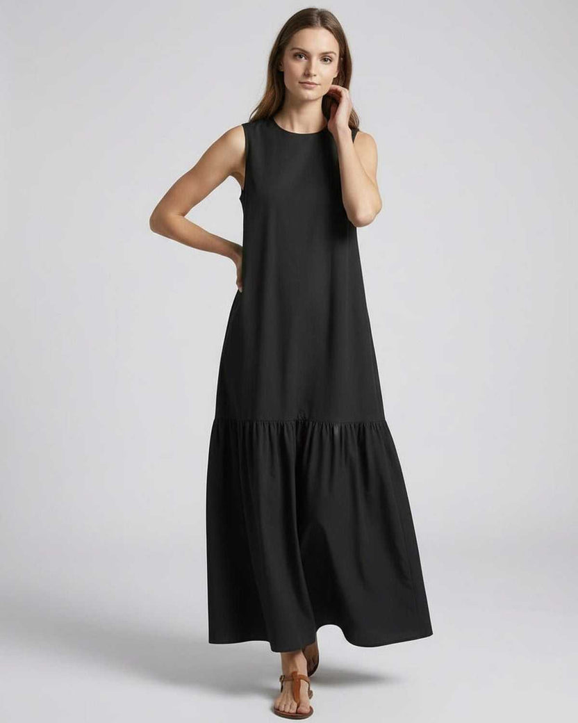 Nocta Midi Dress by Lauven, black sleeveless design, relaxed silhouette, ideal for casual summer elegance.