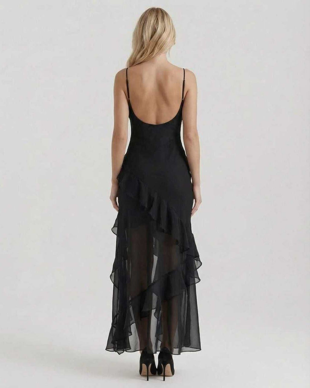 Nocturne Maxi Dress featuring sheer ruffle hem and elegant silhouette, designed by Lauven for a stunning evening look.