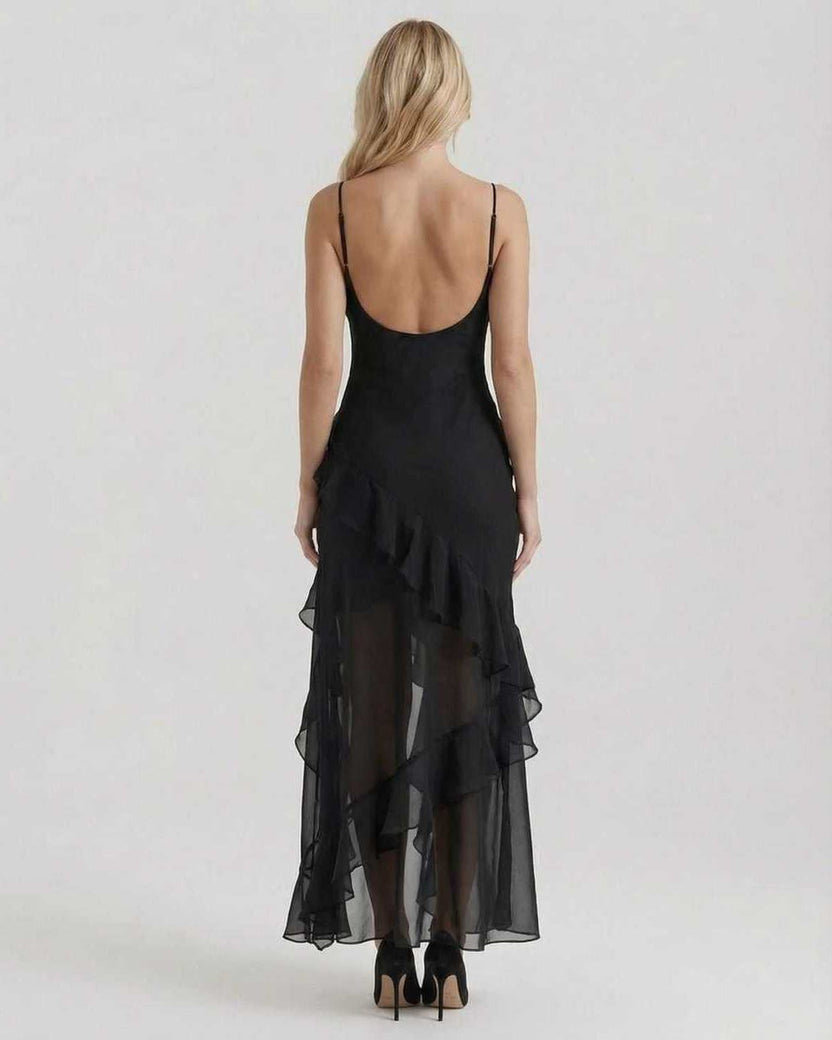 Nocturne Maxi Dress featuring sheer ruffle hem and elegant silhouette, designed by Lauven for a stunning evening look.