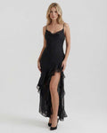 Nocturne Maxi Dress featuring sheer ruffle hem and refined black satin fabric by Lauven for an elegant evening look.