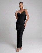 Nocturne Maxi Dress by Lauven, a classic black spaghetti strap evening gown with a sleek pencil silhouette.