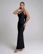 Nocturne Maxi Dress by Lauven, classic black spaghetti strap evening gown in sleek pencil silhouette.