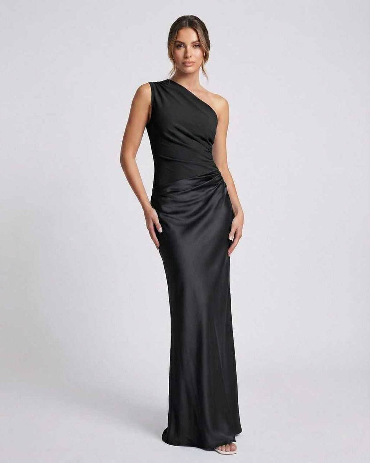 Noelle Maxi Dress | Elegant black one shoulder maxi dress from Lauven, featuring a soft satin-like finish and high waist.