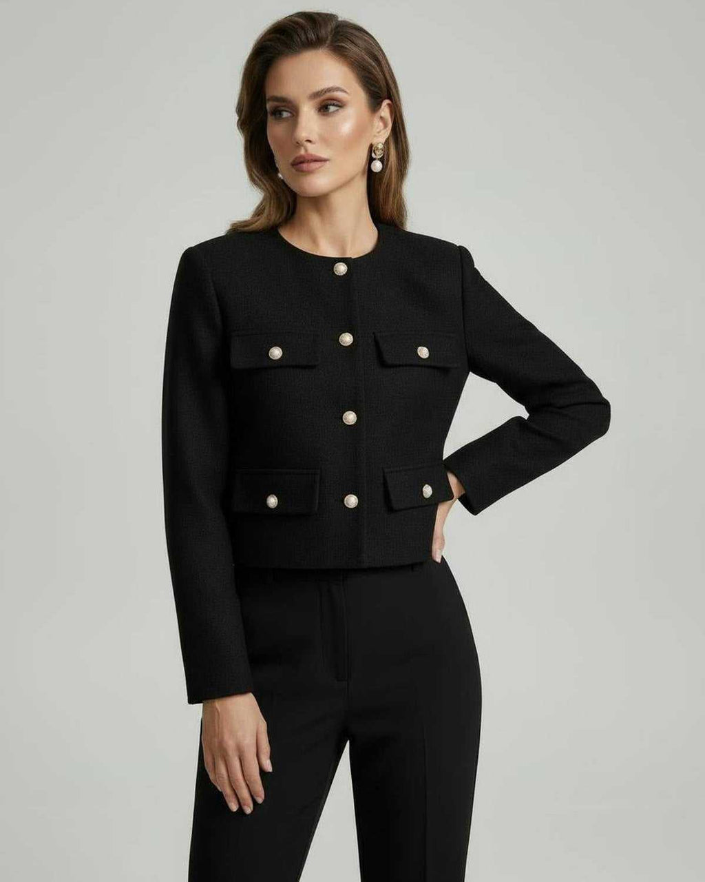 Elegant Noir Jacket by Lauven, a classic black wool blend piece with gold button details, perfect for a chic look.