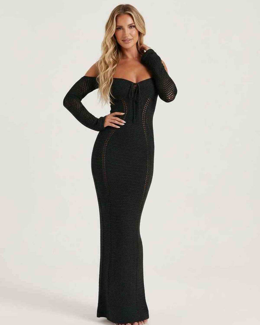 Noir Maxi Dress - Black long sleeve bodycon with open back halter design by Lauven, offering a sleek silhouette.