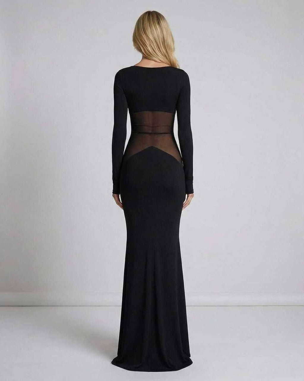 Noir Maxi Dress back view showing long sleeves, sheer mesh waist panel, and flattering silhouette by Lauven.