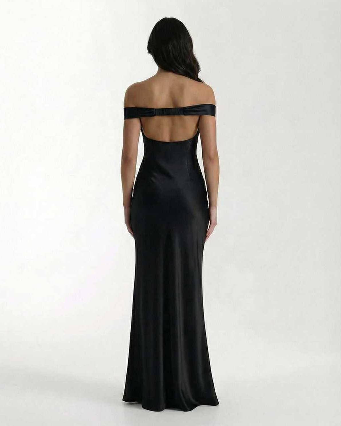 Noir Maxi Dress: Elegant black satin maxi dress with off shoulder design showcasing a sleek silhouette by Lauven.