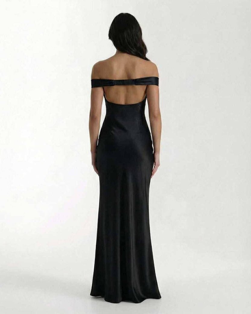 Noir Maxi Dress: Elegant black satin maxi dress with off shoulder design showcasing a sleek silhouette by Lauven.