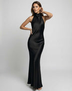 Noir Maxi Dress by Lauven, sleek satin halter neck design, smooth drape, and polished silhouette in black.