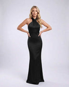 Noir Maxi Dress featuring a halter neck and open back in black satin, perfect for elegant occasions by Lauven.