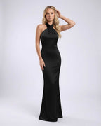 Noir Maxi Dress by Lauven, featuring black satin fabric, halter neck, open back, perfect for elegant occasions.