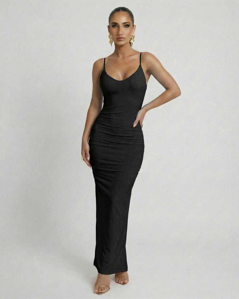 Lauven Noir Maxi Dress - Sleek black sleeveless bodycon design with spaghetti straps for sophisticated evening wear.
