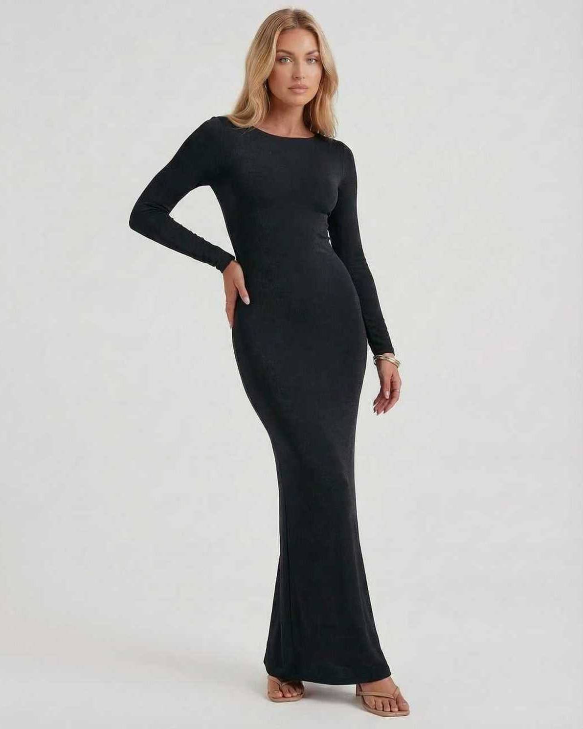 Lauven Noir Maxi Dress featuring an elegant black long sleeve design and an open back for sophisticated style.