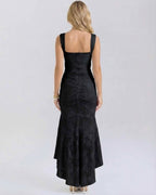 Noir Maxi Dress by Lauven showing back view with pleated details and fish tail hem in black.