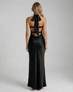 Noir Maxi Dress by Lauven, showcasing the elegant back design with a satin finish and stylish bow detail.