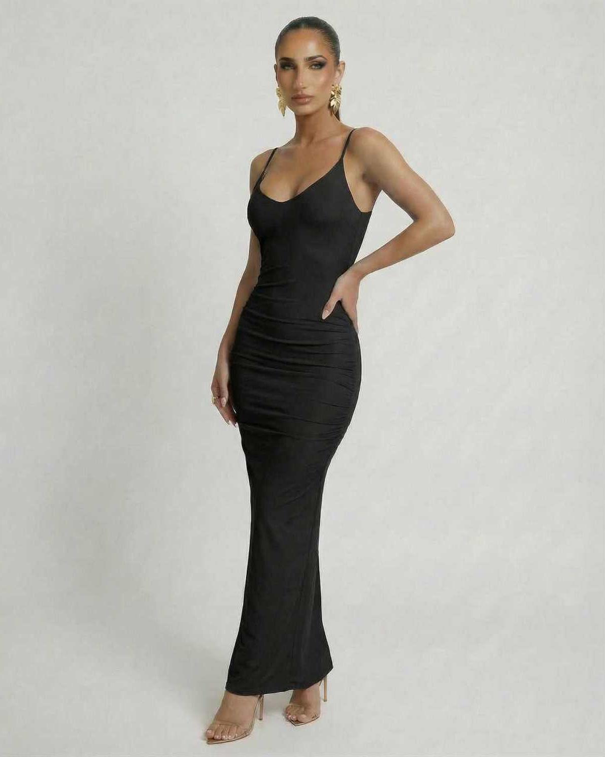 Noir Maxi Dress by Lauven, sleek black sleeveless bodycon with spaghetti straps and dramatic backless design.