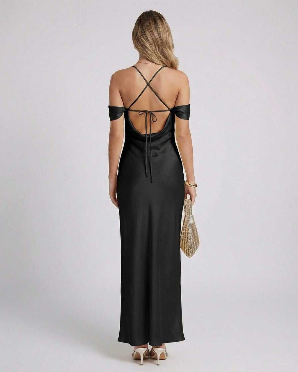 Noir Maxi Dress back view featuring off-the-shoulder design, satin finish, and strappy detail by Lauven.