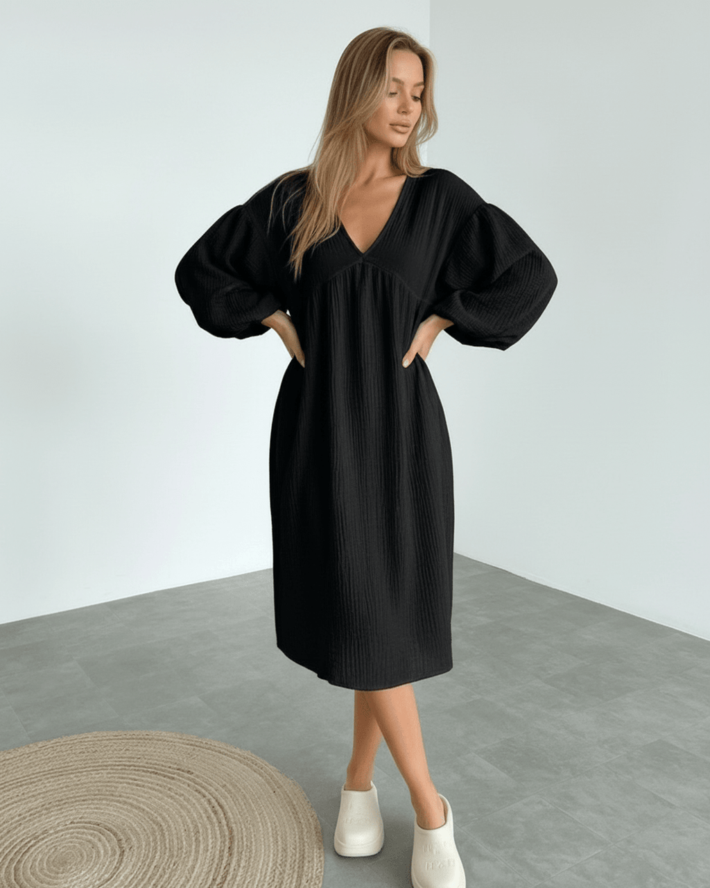 Noir Midi Dress by Lauven, black cotton dress with puff sleeves, timeless elegance, comfortable and sophisticated style.