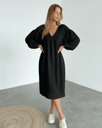 Noir Midi Dress by Lauven, black cotton dress with puff sleeves, timeless elegance, comfortable and sophisticated style.