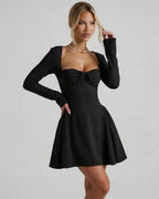 Noir Mini Dress, elegant black long sleeve design, flattering fit-and-flare silhouette by Lauven.
