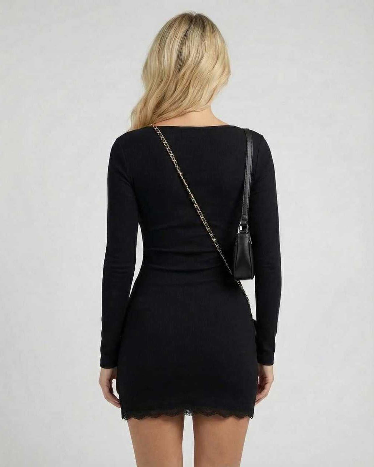 Noir Mini Dress showcasing back view with long sleeves, lace trim, sleek silhouette, by Lauven.