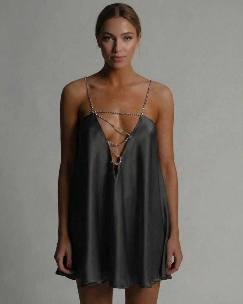 Lauven Noir Mini Dress in satin featuring a hollow V-neckline and beaded straps for a modern look.