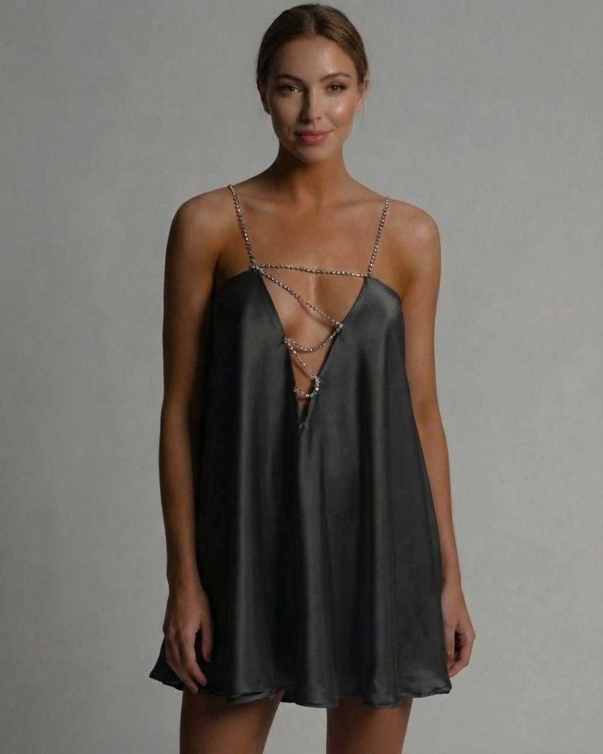 Noir Mini Dress by Lauven featuring a satin A-line silhouette with beaded spaghetti straps.