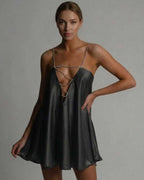 Noir Mini Dress by Lauven featuring a satin A-line silhouette and sparkling spaghetti straps.