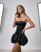 Noir Mini Dress by Lauven - Sleek black strapless bodycon dress with open back and puff skirt for modern elegance.