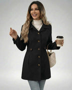 Model wearing the Noir Sculpt Jacket from Lauven, showcasing a stylish black slim fit with buttons.