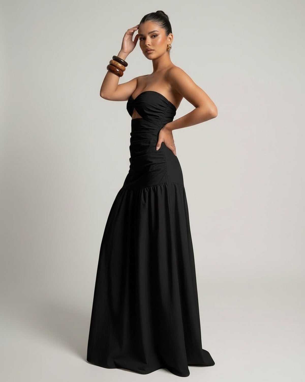 Noira Maxi Dress - Black strapless fitted silhouette with cutout high waist by Lauven, elegant and stylish for any occasion.