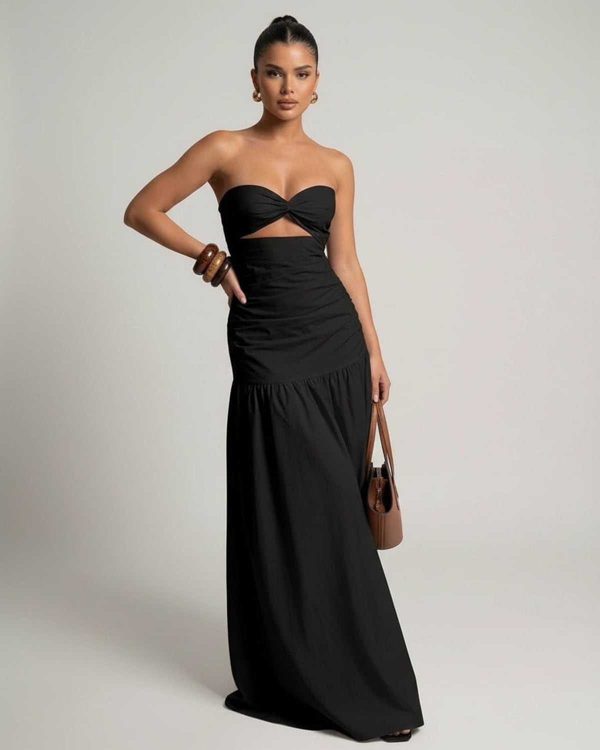 Noira Maxi Dress - Black strapless gown with high waist silhouette, crafted by Lauven for an elegant, modern look.