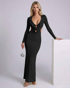 Noiré Maxi Dress featuring a plunging ruffle V-neck, open back, and sleek bodycon fit by Lauven.