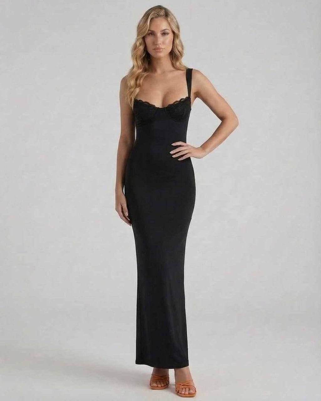 Noiré Maxi Dress by Lauven in sleek black satin, featuring elegant design and refined luxury for upscale occasions.