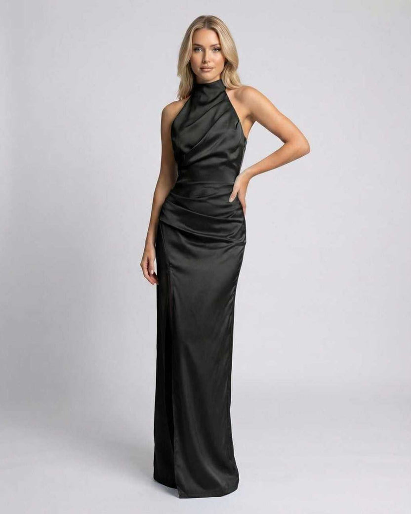 Noiré Maxi Dress featuring black satin, halter neck, high slit, flowy silhouette by Lauven, perfect for elegant occasions.