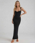 Noiré Maxi Dress by Lauven showcasing sleek black satin elegance with a streamlined silhouette.