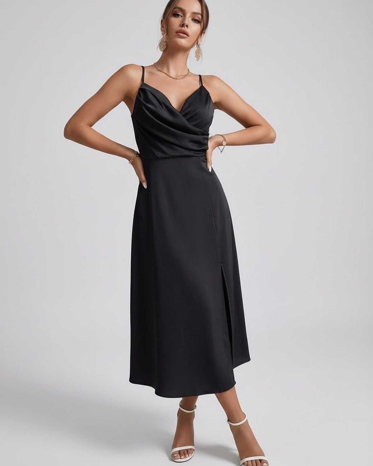 Noiré Midi Dress by Lauven - Elegant black satin dress with spaghetti straps, cowl neck, and refined silhouette.