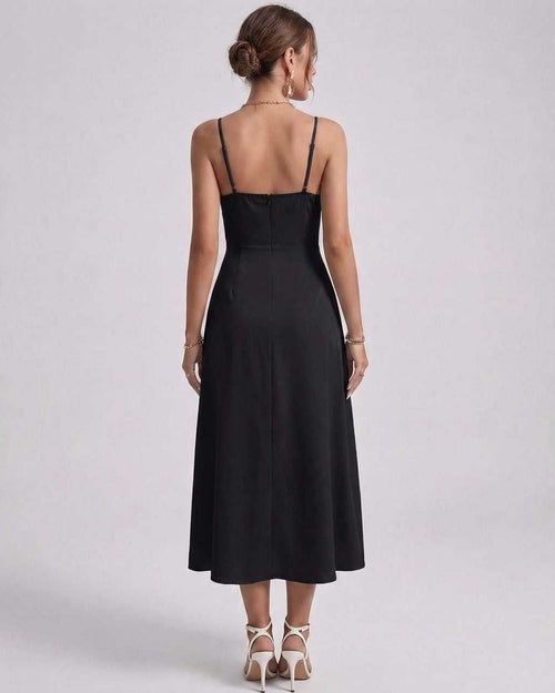 Noiré Midi Dress back view featuring sleek satin finish and delicate spaghetti straps for elegant occasions by Lauven.