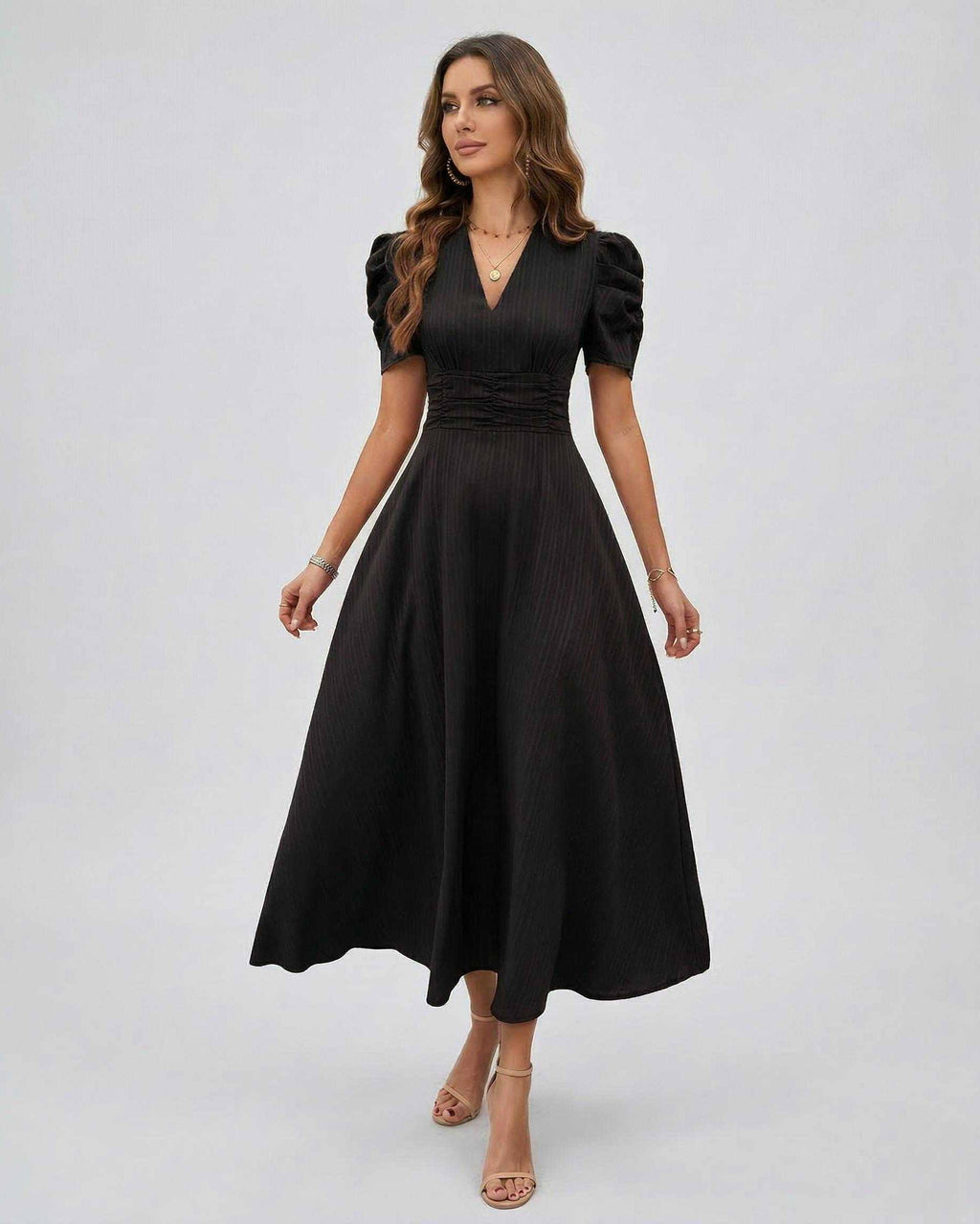 Noire Midi Dress showcasing elegant black fabric, deep V-neck, puff sleeves, perfect for weddings by Lauven.