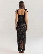 Back view of Lauven Noirelle Maxi Dress, a chic black lace maxi dress with square neckline and tie straps, perfect for formal events.