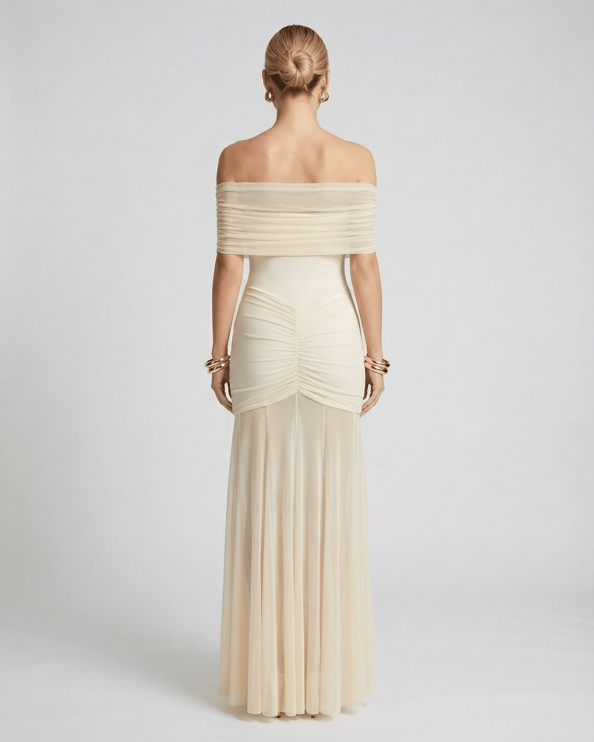 Elegant Noirline Maxi Dress with off-shoulder neckline and ruched bodice, perfect for stylish occasions by Lauven.