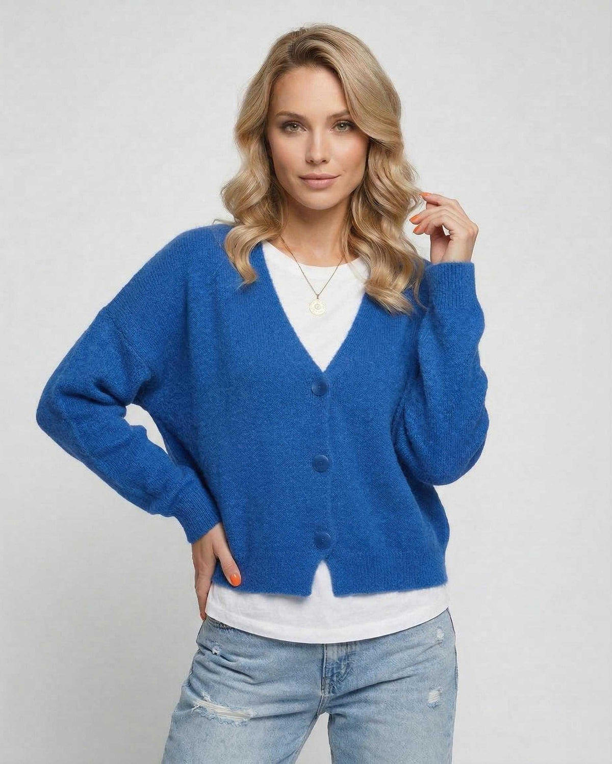 Nova Cardigan in vibrant blue by Lauven, featuring a relaxed fit and cozy knit for stylish layering.