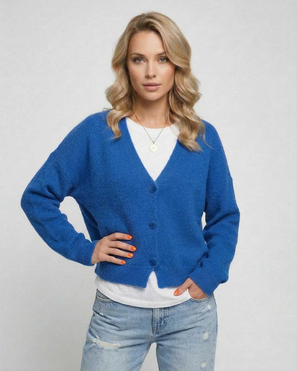Nova Cardigan by Lauven in vibrant blue knitwear, perfect for layering and adding effortless style.