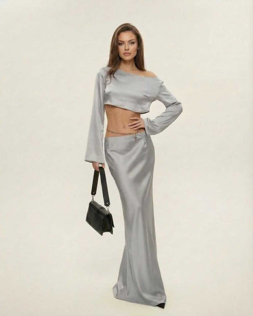 Nova Midi Dress by Lauven, featuring a chic asymmetrical design in sleek silver, perfect for elegant occasions.